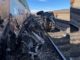 train collides with vehicle